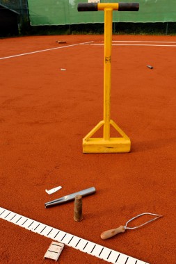 Tennislinierung Neuverlegung Tennisplatz - Werkzeug