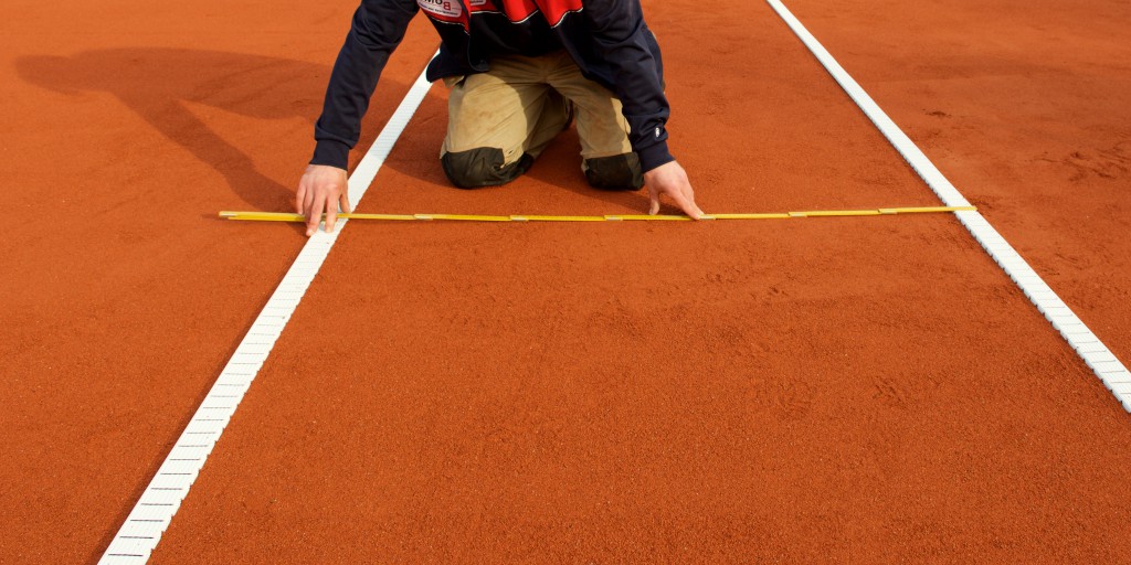 Prozesse und Qualität - Vermessung Tennisplatz -Verlegung
